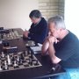 Nigel Barrow evaulates Vineetha's agressive pawn thrust.